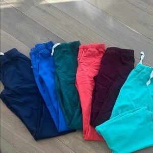 6 pairs of Urbane Ultimate XS scrub pants